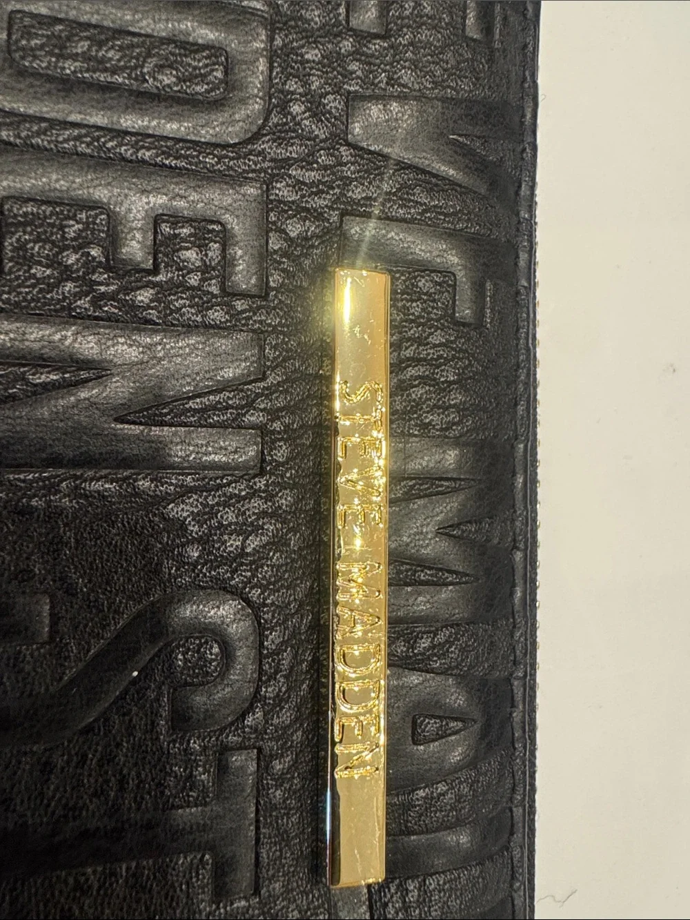 Steve Madden Black Embossed Wristlet with Gold Accent